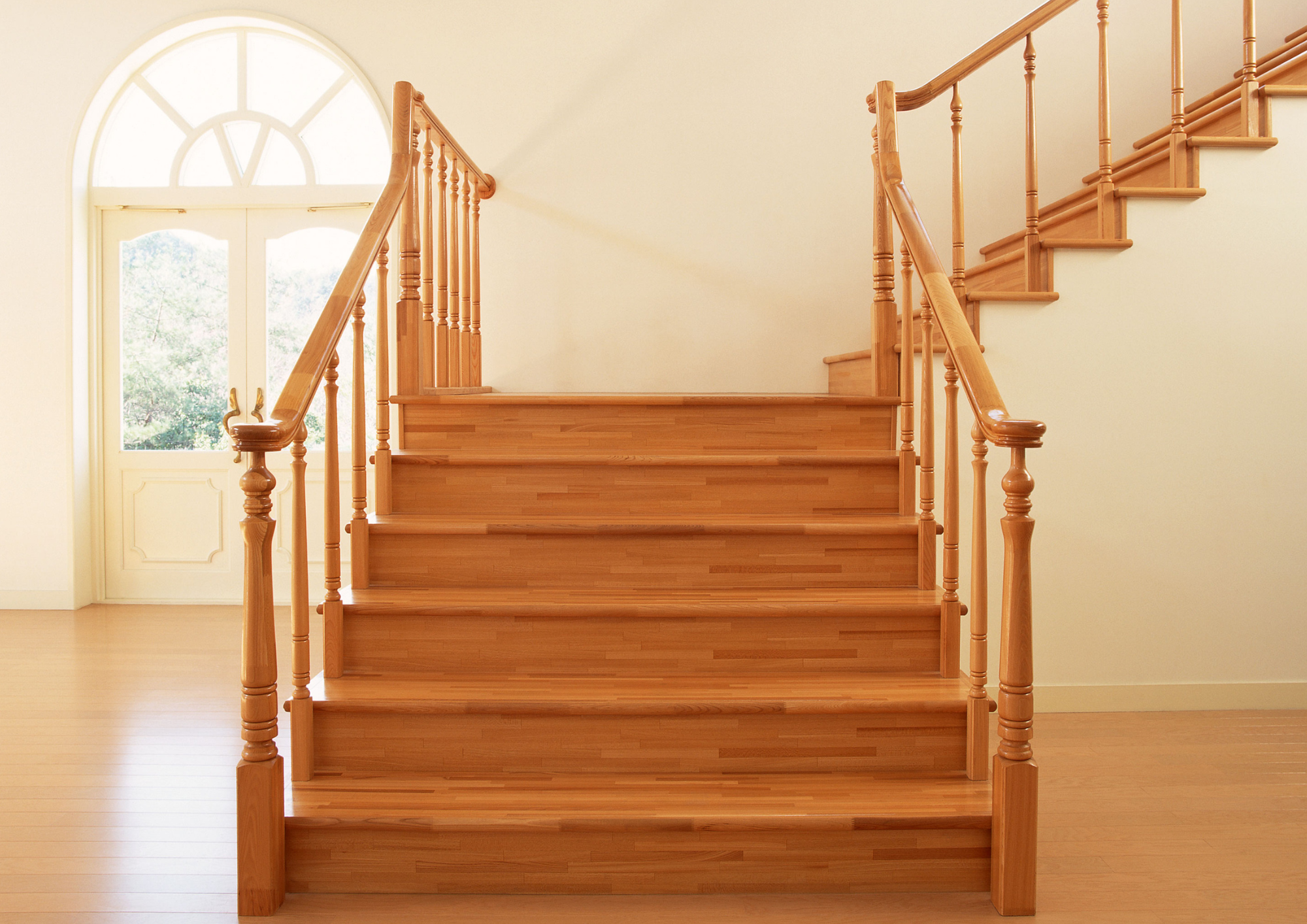 Baseboards and casing installed with tight miters and smooth finish