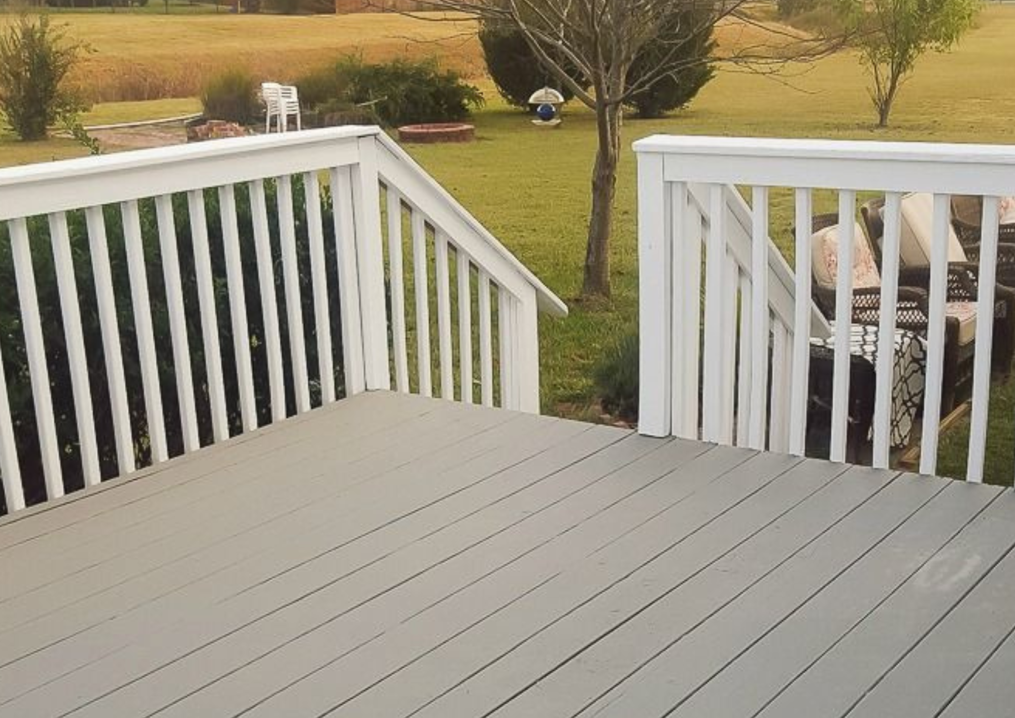 Finished exterior wood surface with renewed color and protection