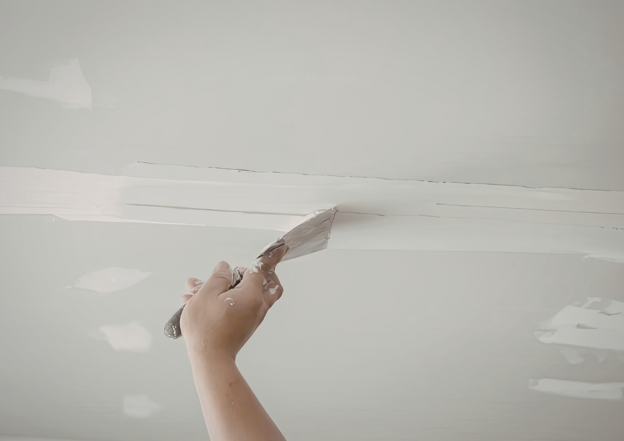 Drywall repair project with smooth wall finishing