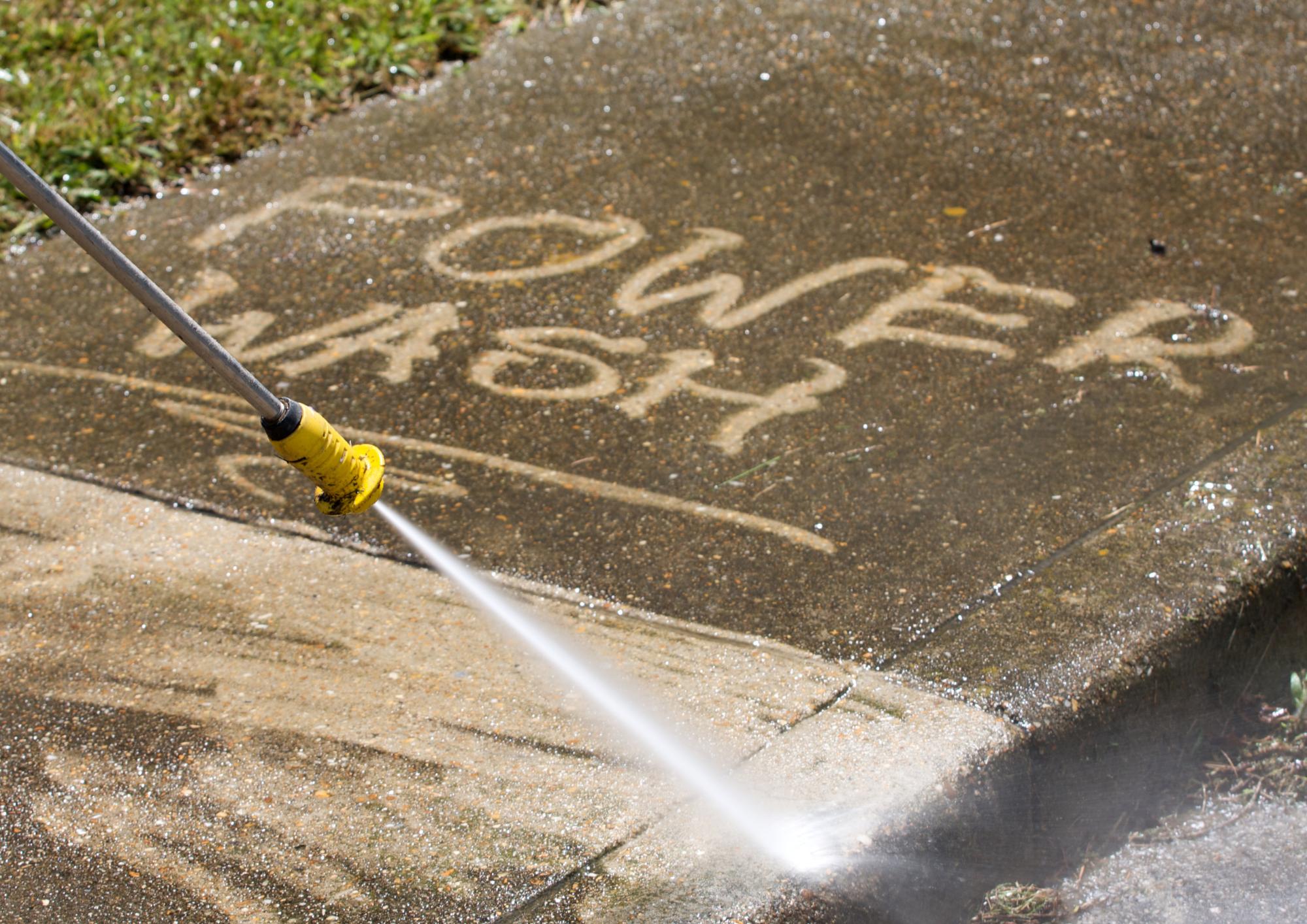 Power washing detail work on exterior surfaces
