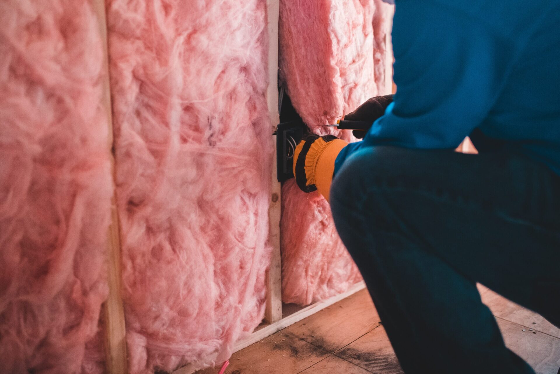 Fiberglass insulation installed in a wall cavity